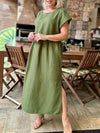 Solid color round neck hem slit back button long dress