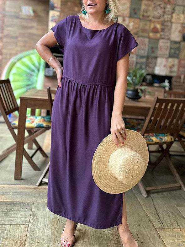 Solid color round neck hem slit back button long dress