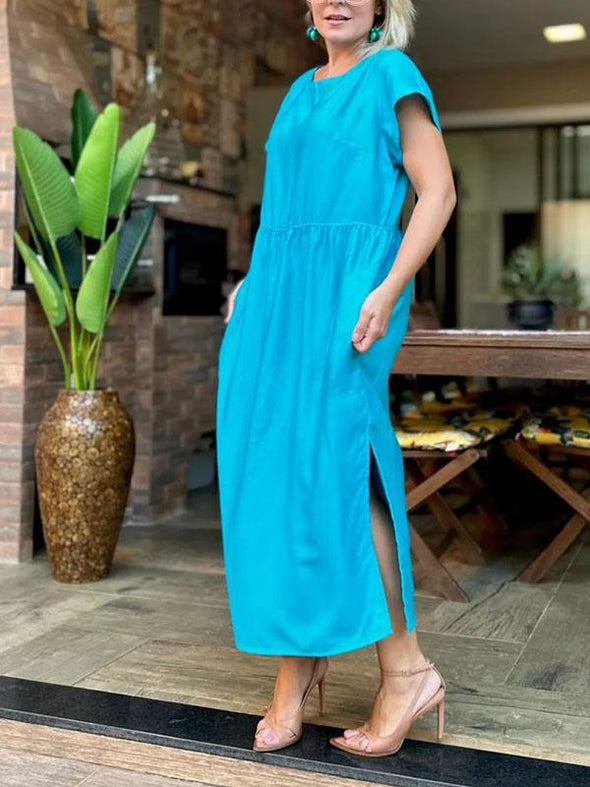 Solid color round neck hem slit back button long dress