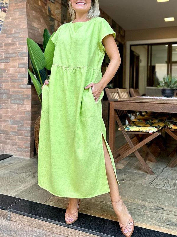 Solid color round neck hem slit back button long dress